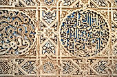 Alhambra  Carved stucco ornament and glazed tile 