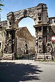 Catania - piazza Dante. Il portale barocco del Monastero dei Benedettini. 