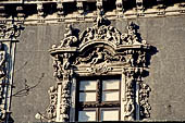 Catania - Palazzo Biscari - decorated window of the facade of the palace.