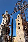 The cathedral of Cefal - One of the two big tower behind the iron gates of the churchyard. 