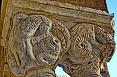 The cathedral of Cefal - The cloister. Capitals of the west side: Capital with griffin, lizard and lion.  