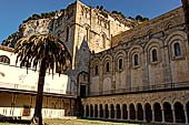 The cathedral of Cefal - The cloister. View of the church against the cliff of the Rocca. 