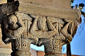 The cathedral of Cefal - The cloister. Capitals of the south side: Capital with acrobats. 