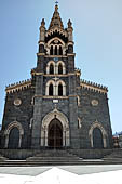 Randazzo - The basilica of St. Mary. The facade with the neo-gothic bell tower (XIX c). 