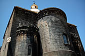 Randazzo - The basilica of St. Mary. The apses (XV c.) of black basalt blocks. 