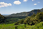 The road to Amed has spectacular scenery with views of rice paddies and plantations around Gunung Lempuyang.