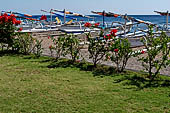 The Amed area is comprised of many traditional little fishing villages. The black sand beach is always full with the pretty traditional jukung fishing outrigger canoes lined up on the sand.