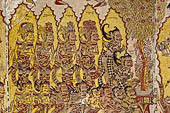 Klungkung - Bali. The Kerta Gosa palace, paintings of the upper levels. Group of gods surrounded by aura.