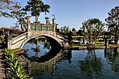 Tirtagangga, Bali - The stone bridges connecting the demon island in the middle of the south pond.