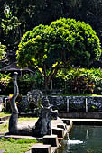 Tirtagangga, Bali - Details of the various fountains pouring water in the ponds.