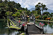 Tirtagangga, Bali - The stone bridges connecting the demon island in the middle of the south pond.