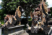 Tirtagangga, Bali - The sculptures of Barong and Rangda representing the eternal struggle between good and evil.