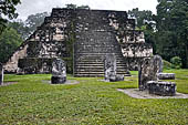 Tikal - Twin Pyramid Complex Q, East Pyramid. Uncarved stele and altar pairs are arranged in front of the pyramid.