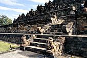 Borobudur - Stairway with 'makaras' at the base of the monument.