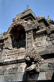 Borobudur - Water sprouts shaped like makaras are used on the lowest level, at the upper levels kala-like faces are used.