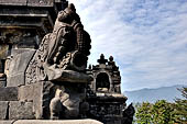 Borobudur - Water sprouts shaped like makaras are used on the lowest level, at the upper levels kala-like faces are used. 