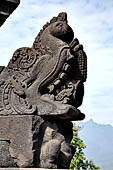 Borobudur - Water sprouts shaped like makaras are used on the lowest level, at the upper levels kala-like faces are used. 