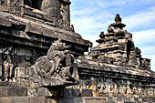 Borobudur - Water sprouts shaped like makaras are used on the lowest level, at the upper levels kala-like faces are used. 