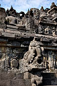 Borobudur - Water sprouts shaped like makaras are used on the lowest level, at the upper levels kala-like faces are used. 