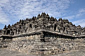 Borobudur - The outer wall of the first balustrade decorated with reliefs of celestial beings and guardian demons.