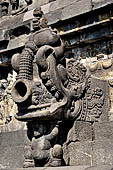 Borobudur - Water sprouts shaped like makaras are used on the lowest level, at the upper levels kala-like faces are used.