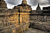 Borobudur - detail of the outer balustrade of the galleries. 