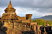 Borobudur - detail of the outer balustrade of the galleries. 