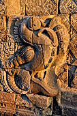 Borobudur - Kala-makara motifs decorating gateways leading from one gallery level to the next. 