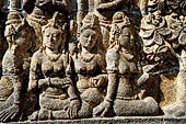 Borobudur reliefs - First Gallery, North-Eastern side - Panel 110. The merchant Maitrakanyaka is greeted by nymphs. 