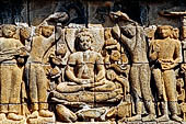 Borobudur reliefs - First Gallery, North-Eastern side - Lalitavistara. Panel 119. Disciples bathe Buddha in a lotus pond. 