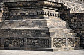 The four Mahakarmavibhangga panels viible today at the Southeastern corner of Borobudur