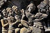 Borobudur reliefs of the First Gallery balustrade - Panel 29. Scene from the Jatakamala, the future Buddha is attacked by ogres. 