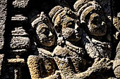 Borobudur reliefs of the First Gallery balustrade - Panel 29. Scene from the Jatakamala, the future Buddha is attacked by ogres. 