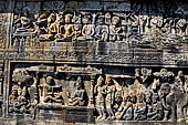 Borobudur reliefs - First Gallery, Northern side - Lalitavistara. Panel 77. Sakiamuni and disciples meditate at Nairanjana river.