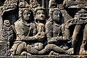 Borobudur reliefs - First Gallery, Northern side - Panel 83. Lalitasvitara eposode, gods are offering the monk robe to Gautama. 