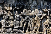 Borobudur reliefs - First Gallery, Northern side - Panel 83. Lalitasvitara eposode, gods are offering the monk robe to Gautama. 