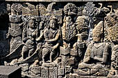 Borobudur reliefs - First Gallery, Northern side - Panel 90. A pair of kinnaras, celestial beings half bierd half human. 