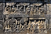 Borobudur reliefs - First Gallery, Northern side - Lalitavistara. Panel 92. Gods decorate the bodhi trees. 