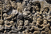 Borobudur reliefs - First Gallery, Northern side - Panel 95. Unidentified scene of children playing in a river. 