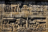 Borobudur reliefs - First Gallery, Northern side - Lalitavistara. Panel 98. Gods bathing Buddha. 