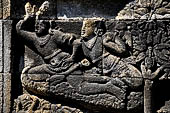 Borobudur reliefs - First Gallery, Northern side - Panel 99. 