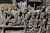 Borobudur reliefs - First Gallery, Northern side - Panel 100. 