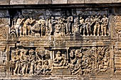 Borobudur reliefs - First Gallery, Northern side - Lalitavistara. Panel 102. Sakiamuni and ascetics at a banyan tree. 