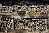 Borobudur reliefs - First Gallery, Northern side - Lalitavistara. Panel 104. Four great kings offer Buddha stone bowls. 