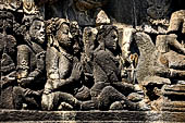 Borobudur reliefs - First Gallery, Northern side - Lalitavistara. Panel 103. Sakiamuni and merchants. 