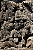 Borobudur reliefs - First Gallery, Northern side - Panel 105. 