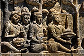 Borobudur reliefs - First Gallery, North-Eastern side - Panel 109, Lalitasvitara eposode, citizens of a city bring offerings to Gautama. 