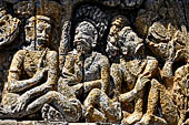 Borobudur reliefs - First Gallery, North-Eastern side - Panel 117. Detail showing the Gautama disciples depicted as forest dwelling ascetics. 