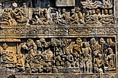 Borobudur reliefs - First Gallery, South-Eastern side - Panel 3. Lalitavistara, Gods descend to earth to teach brahmans. Lower half Manohara Avadāna. 