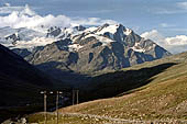 Valtellina Parco dello Stelvio - La Val Cedec in ombra con sullo sfondo la conca del ghiacciaio dei Forni fino al Pizzo San Matteo. 